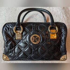 Metro City Black Quilted Boston Handbag Beautiful Looks New!
